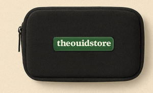 The Ouid Store black zip stash pouch with green wordmark badge